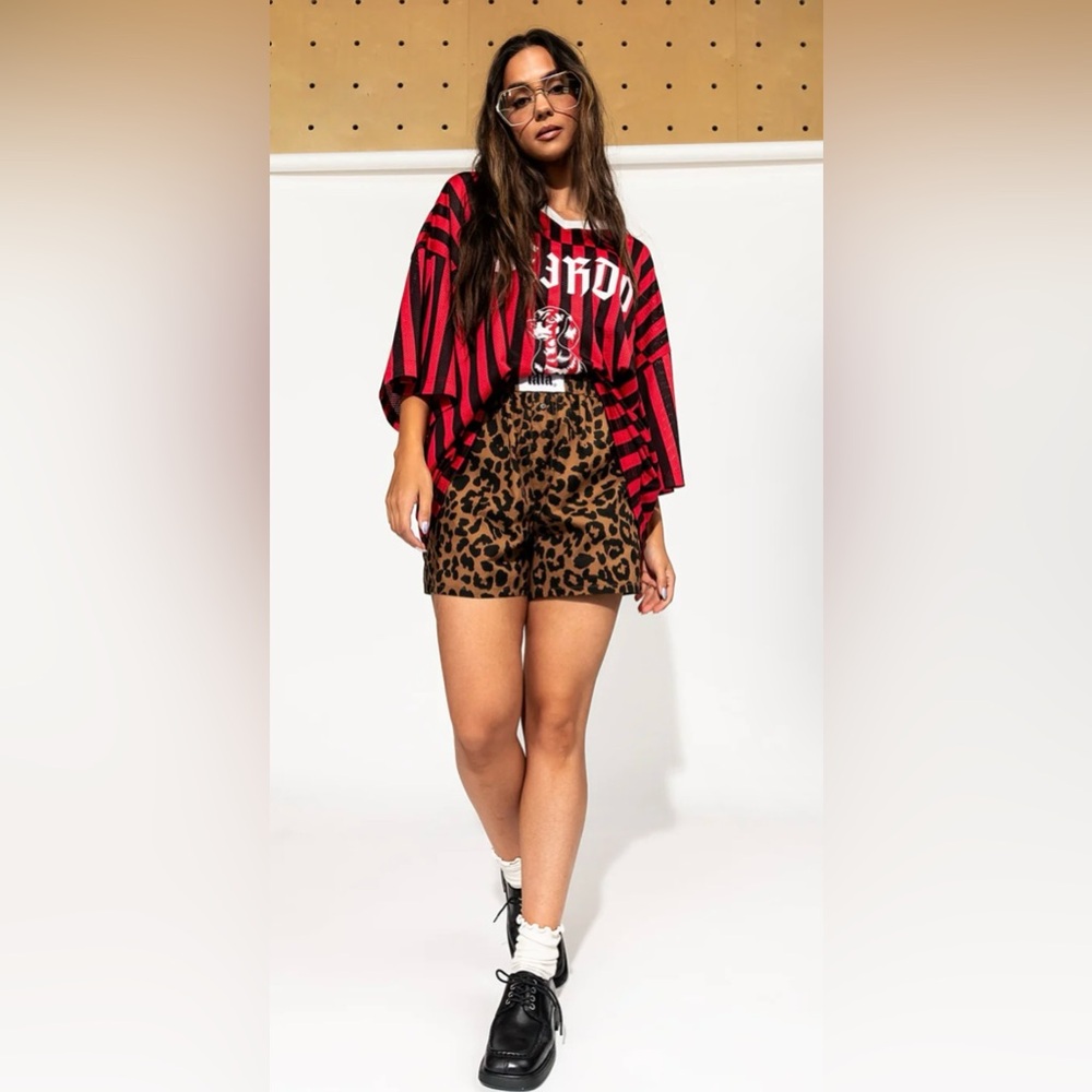 Dressed in LALA leopards boxer type shorts